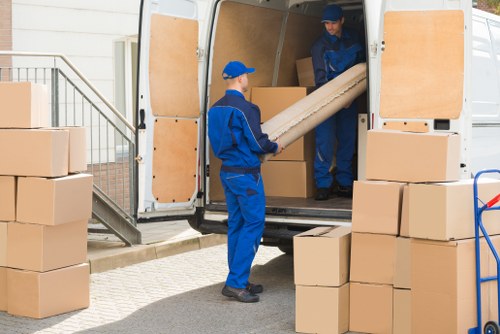 Man and van loading furniture in Hampstead street