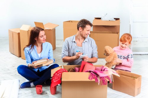 Packed office equipment and furniture ready for a Hampstead business move