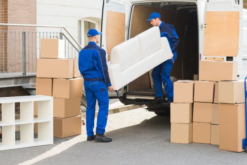 Delivery team transporting household items