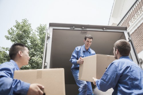 Removal team planning a Hampstead street move near period homes