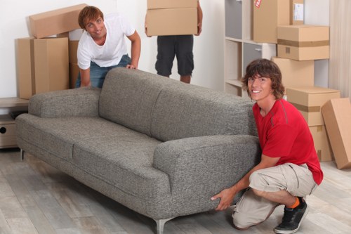 Packed boxes and furniture prepared for a house move in Hampstead