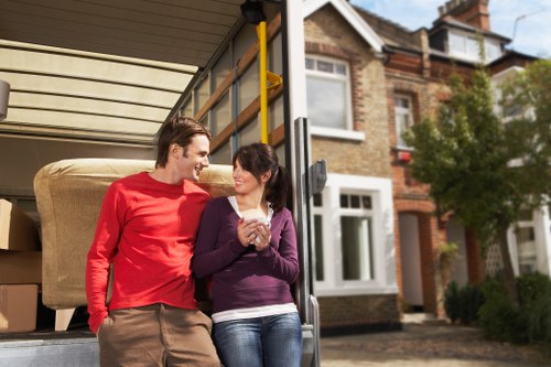 Removalists unloading boxes into a Hampstead home